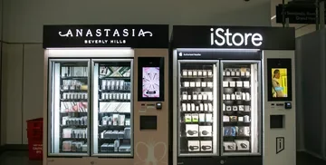 Anastasia Beverly Hills vending machine, adjacent to an iStore vending machine