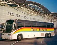 A Marin Airporter Bus parked in front of the SFO International Terminal.