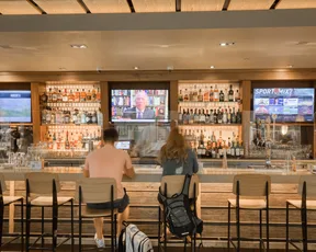 Customers at the bar seating area of Lark Creek Grill, Terminal 2 SFO