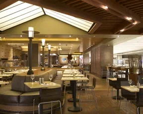 Booth and table seating at Lark Creek Grill, Terminal 2 SFO