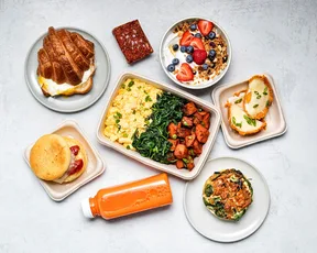 Breakfast sandwiches, yogurt bowls, platters, and fresh juices at Proper Food, SFO